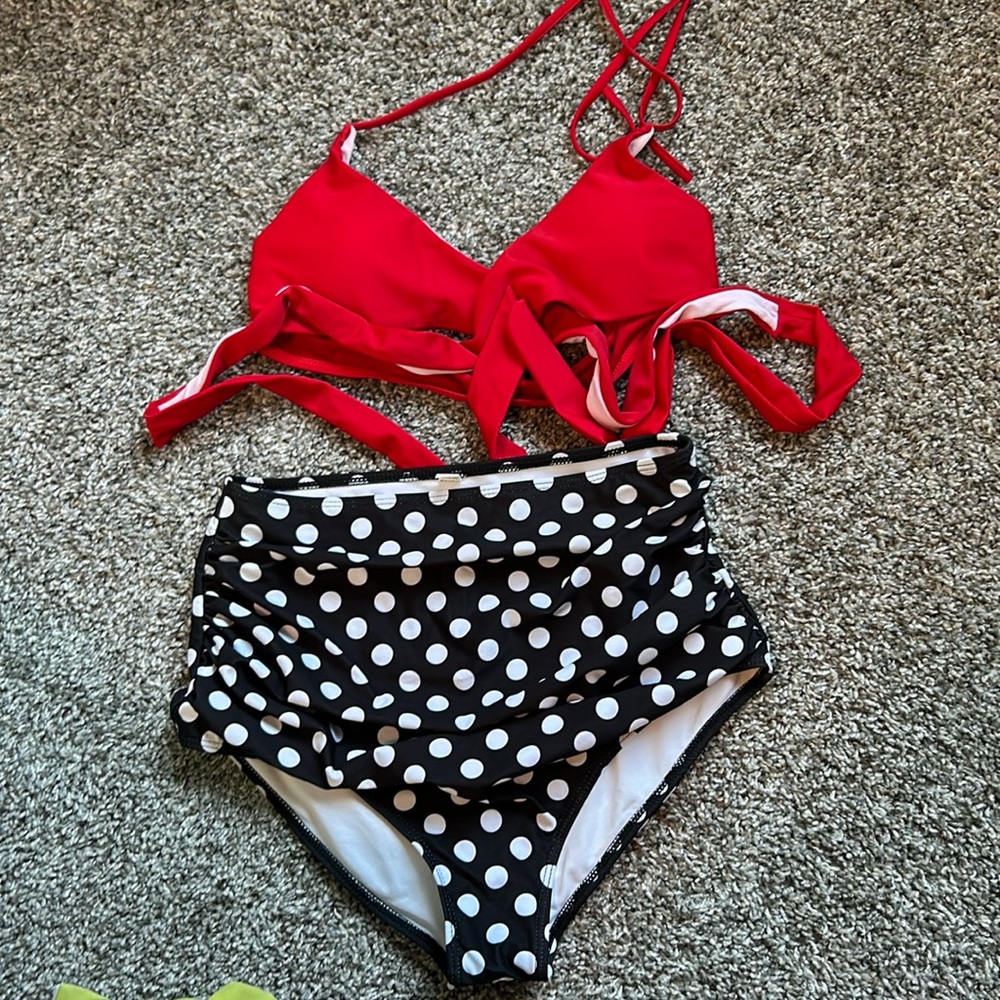Bikini set size medium women’s. Red bikini top black and white polka dot bottoms